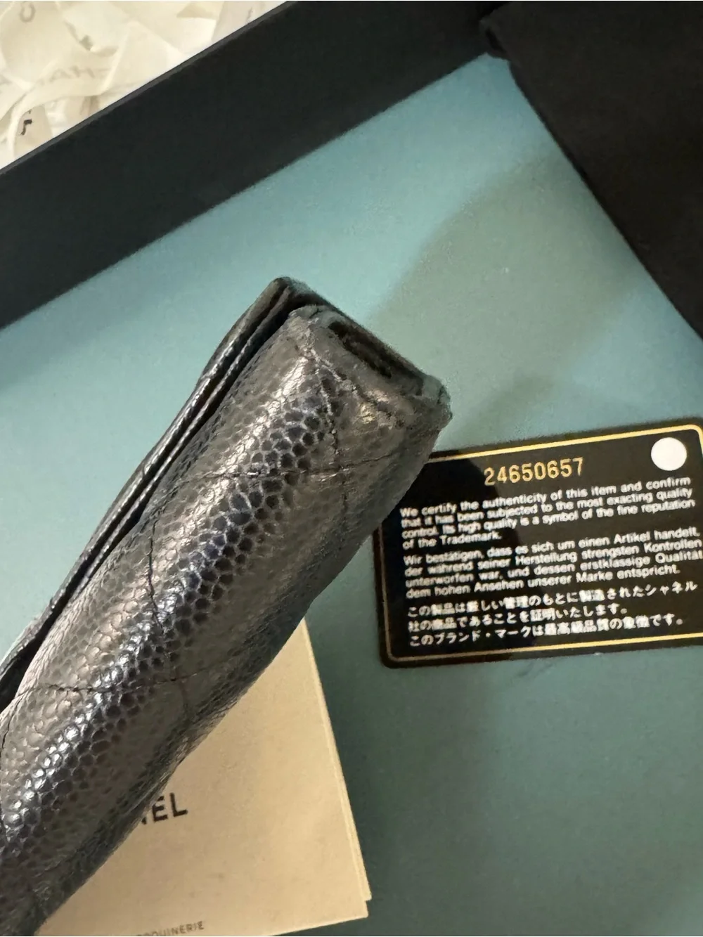 CHANEL Black Quilted Caviar Leather Wallet with Gold CC Lock